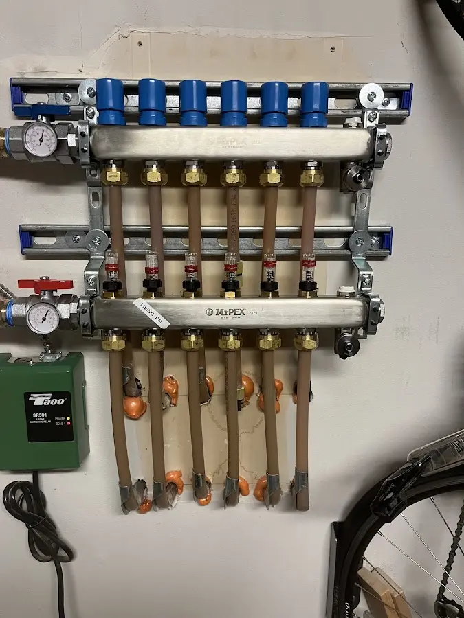 Plumber performing Gas Leak Detection at a residential property in Carrboro